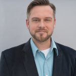 Daniel Tutt is the Director of Programs and Producer